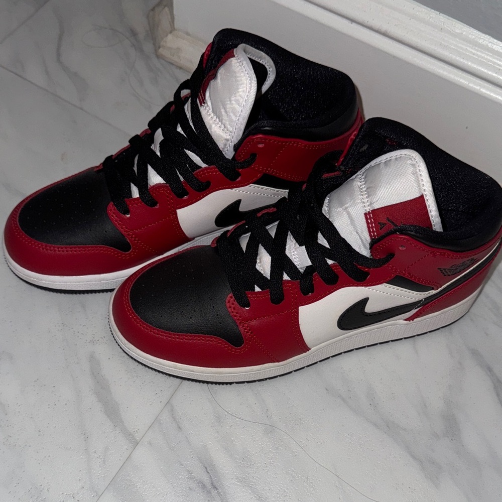 Nike Air Jordan 1s Black and Red High Tops